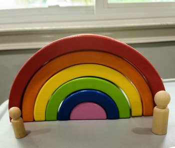 reviewer's rainbow toy on table