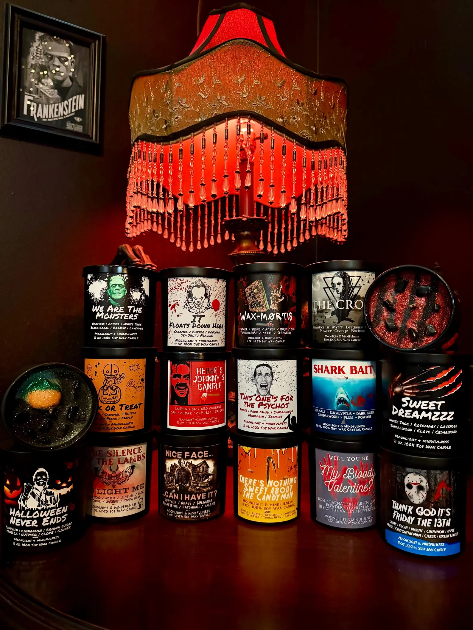 Collection of candles with horror-movie-themed labels