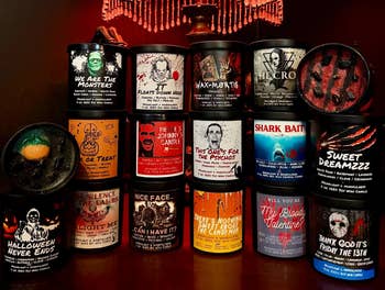 Collection of candles with horror-movie-themed labels