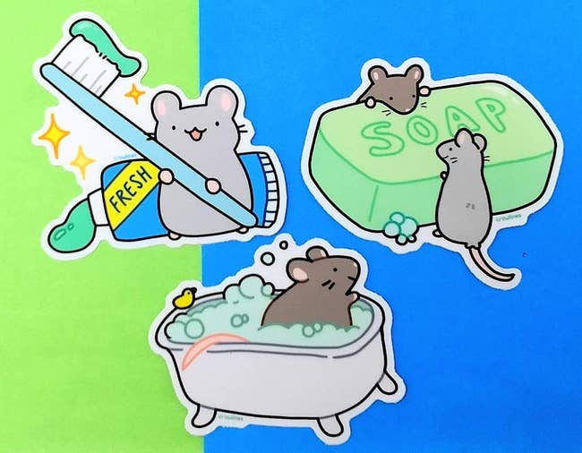 stickers of mice in a bathtub, with soap, and with toothpaste