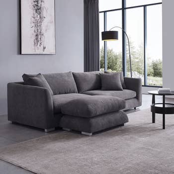 the gray couch from the side