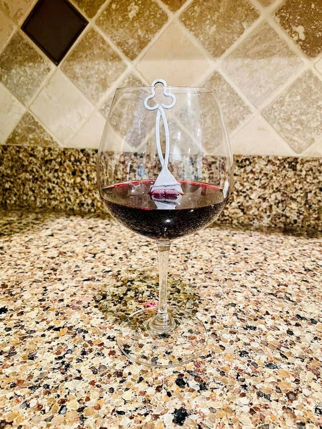 A solid of vino with a vino wand wrong it