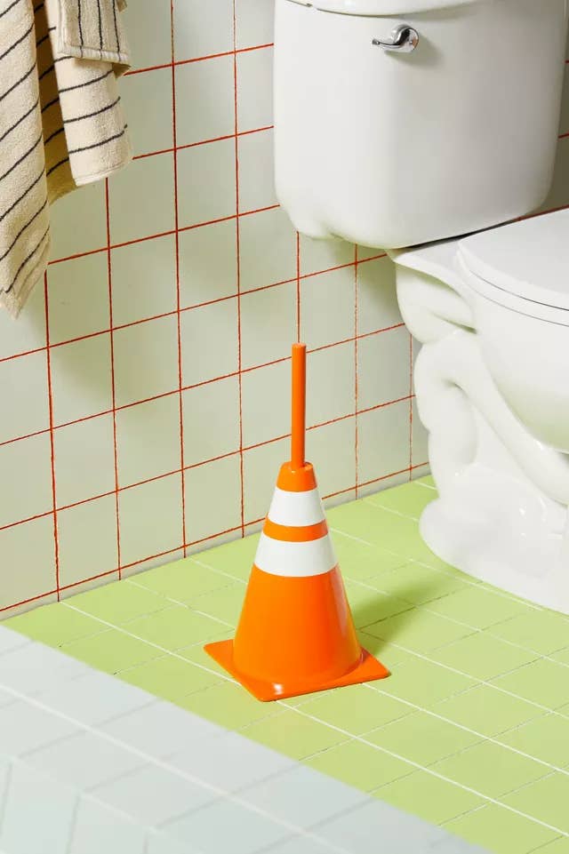 traffic cone with brush coming from top