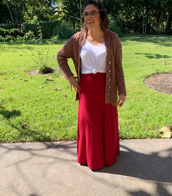 another reviewer wearing the deep red skirt