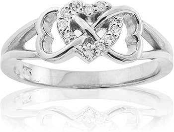 the ring that has diamonds on the center heart