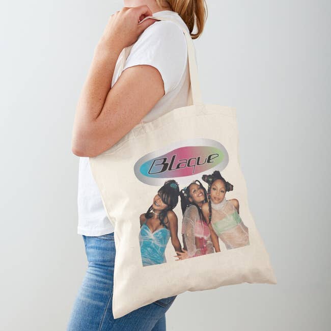 tan cotton tote bag with a printed image of Blaque on it and their logo 