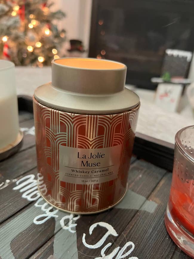 reviewer image of the whiskey caramel candle on a table