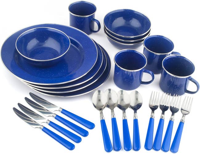 Photo of the blue speckled set. There are four plates, four bowls, and four mugs, along with four each of forks, knives, and spoons