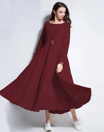model wearing the burgundy dress