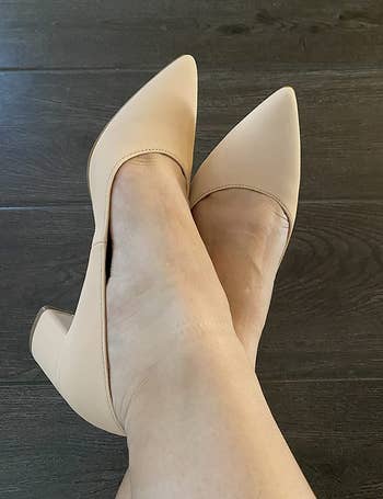 Image of reviewer wearing beige heels