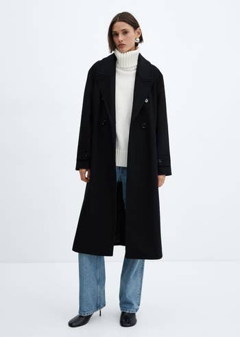 model in black wool midi coat