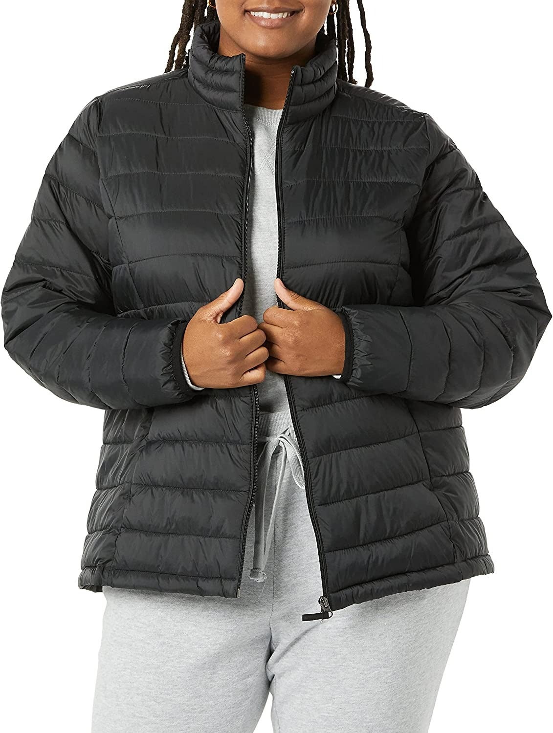 plus size model wearing the black jacket