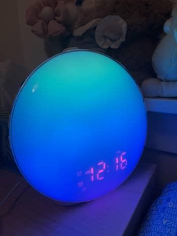 Glowing sunrise alarm timepiece successful blue