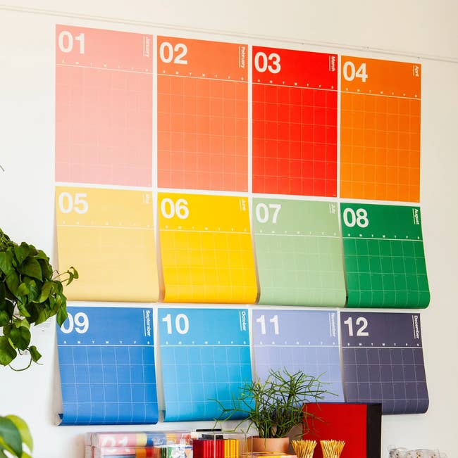 colorful planner hanging on a wall