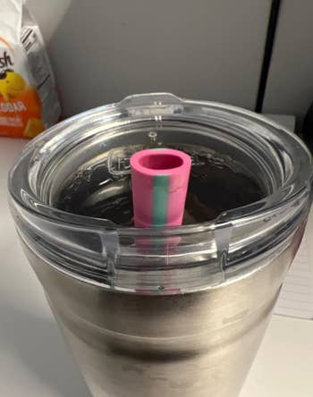 pack up of pink straw to video display the oval form 