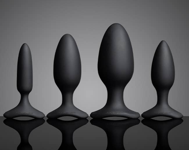 Four achromatic silicone plug designs successful varying sizes, displayed upright