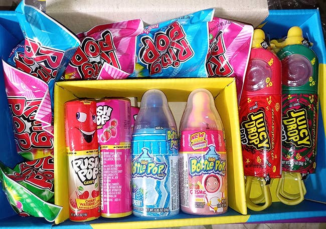 A look inside the box filled with various candies 