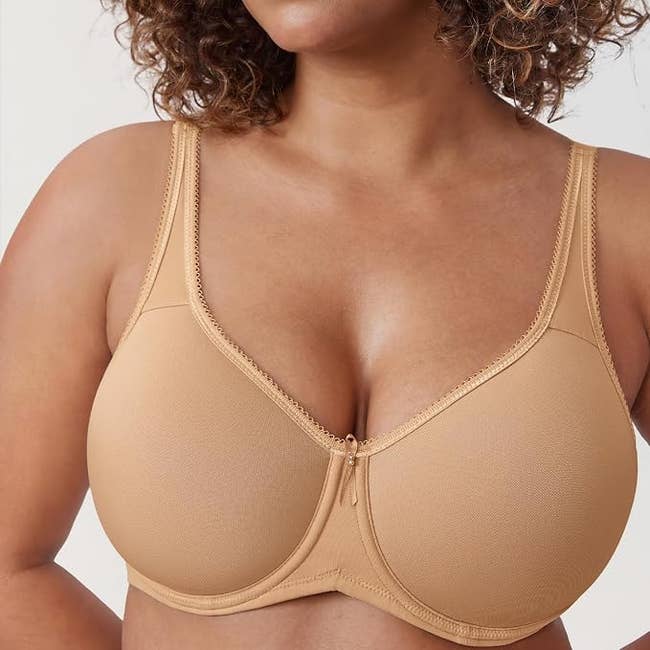 A adjacent up of the bra worn by a model