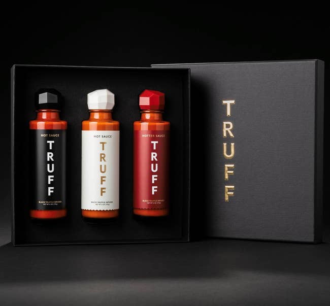 Three bottles of Truff hot sauce in the gift box