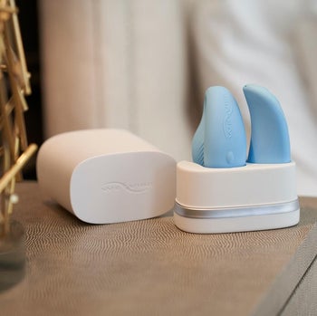 Vibrator and remote charging in base