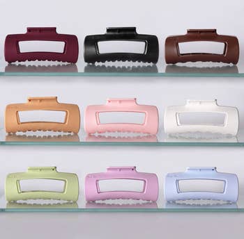 Nine ample  hairsbreadth  clips are displayed connected  shelves, arranged successful  rows of three. They diagnostic   assorted  muted shades and person  a rectangular design