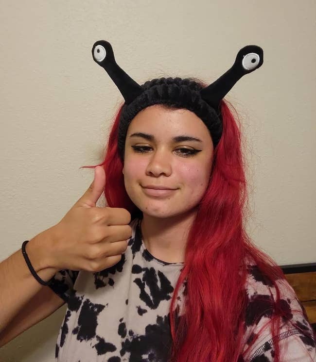 image of reviewer wearing the black snail headband