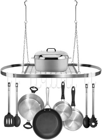 Product with close-up of hooks and chain, pans hanging, and dish on shelf on a white background