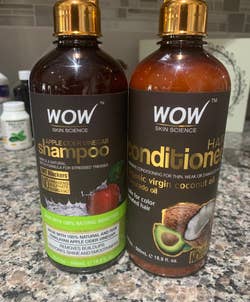 A reviewer's photo of the shampoo and conditioner