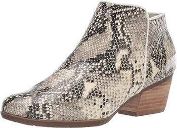 Ankle boot with a snakeskin pattern and a low, stacked heel