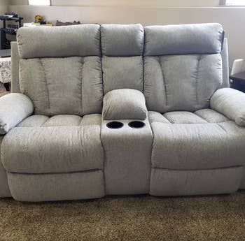 reviewer photo of gray reclining sofa