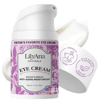 the eye cream in its pretty purple packaging