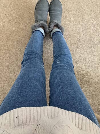 reviewer showing the full blue jean leggings