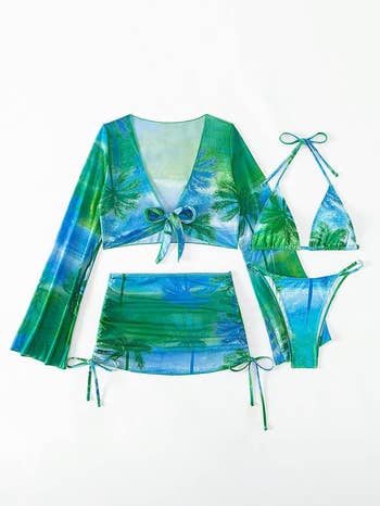 Tropical print swimwear set with a tie-front top, bikini, and wrap skirt