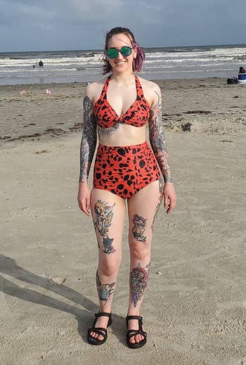 reviewer wearing the high-waisted two piece in red and black