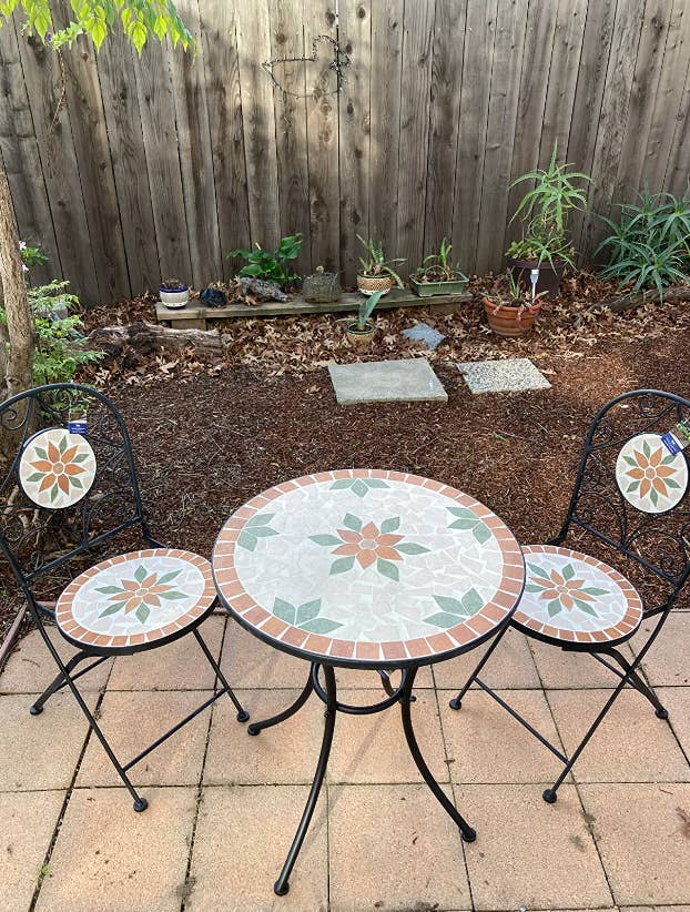 three piece tile bistro set in reviewer's backyard