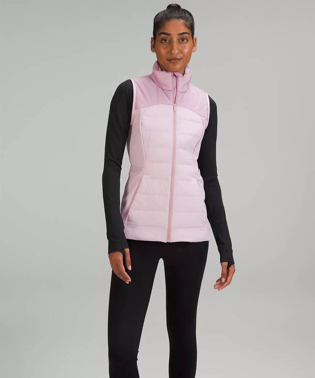 model wearing the vest in light pink