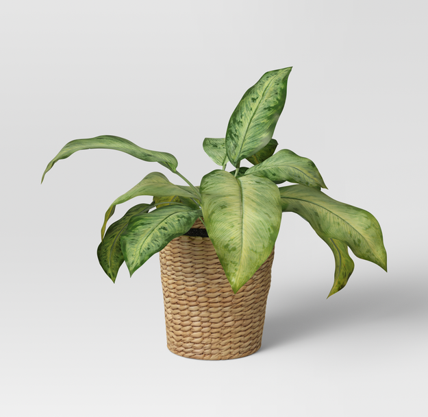 Faux plant in woven planter