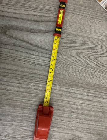 reviewer photo of the red and yellow hang-o-matic