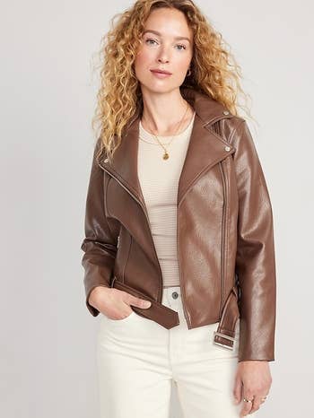 model wearing brown jacket with buckle