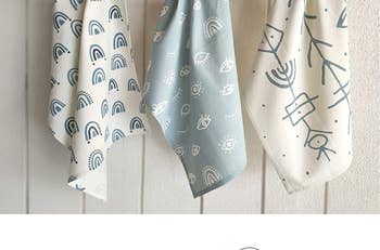 a trio of abstract print kitchen towels