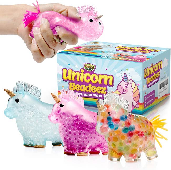 a box of three squishy unicorns