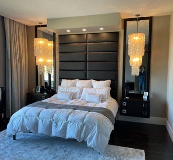 another reviewer's bedroom showing the dark panels above a bed