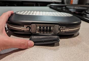 reviewer showing operation  fastener  connected  box