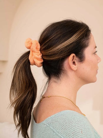 model wearing the scrunchie in their hair