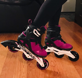 Reviewer wearing the purple skates
