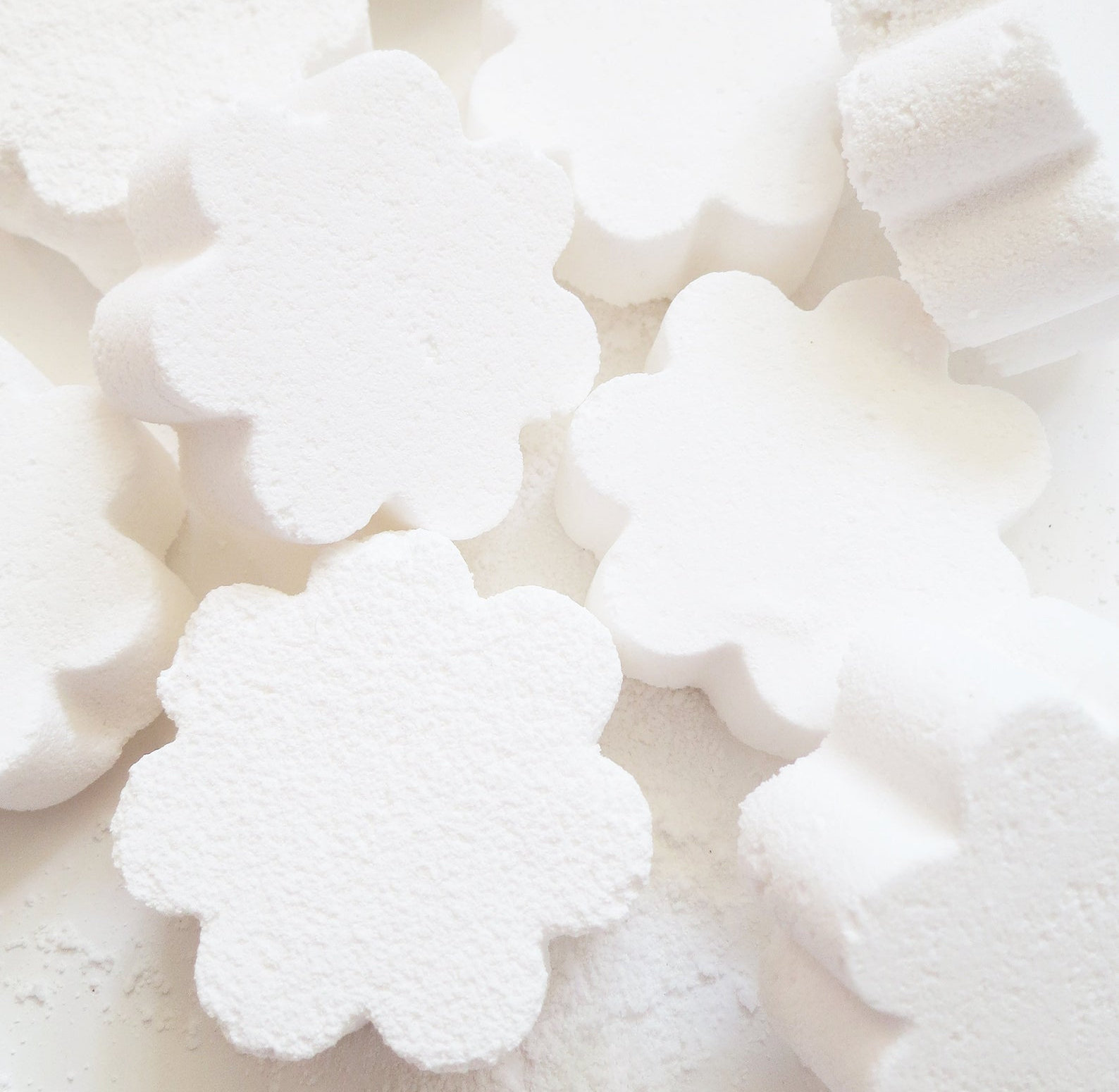 White flower-shaped toilet bombs