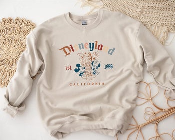 the cream colored version of the sweatshirt 