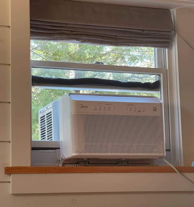 reviewer photo of the unit on a window sill