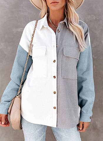 a model wearing a white, gray, and blue color-blocked corduroy shacket