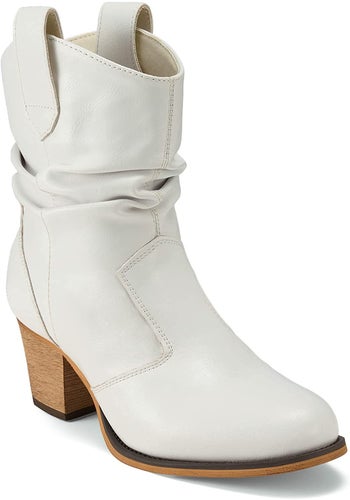 White slouchy ankle cowboy boot on a white background